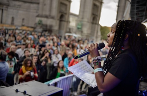 Climate activist Elizabeth Wathuti addressing other activists in Brussels to demand climate justice