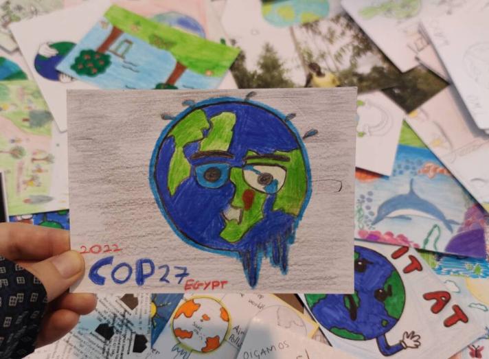 SPARK handed over thousands of hand-drawn postcard messages from young people to COP27 negotiators
