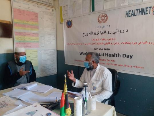 Mr. Shameer with psychosocial counselor during individual psychosocial counseling session in Najmul Jehad clinic