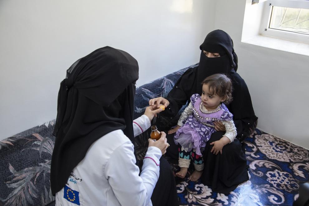 Bashaier visiting one of the targeted house in her mission to serve medical care