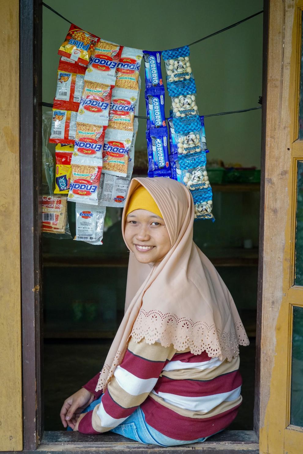 Indonesian girl shop-keeper