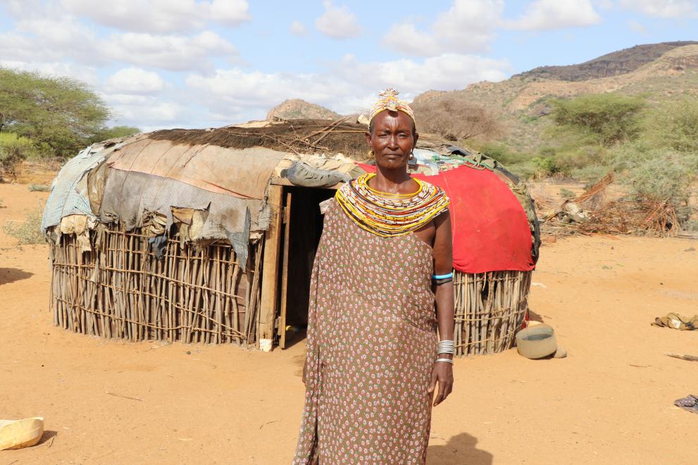 Ngulisia Arabolia outside her manyatta - the home she shares with her family.
