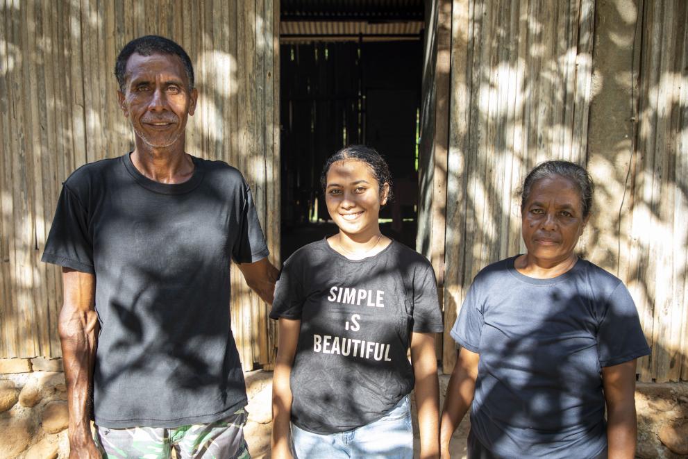 Bento Pereira with his daughter and wife in his house in Maliana, Bobonaro municipality