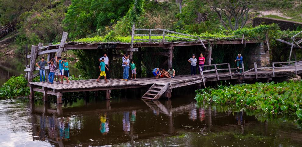 People by a river in Paraguay